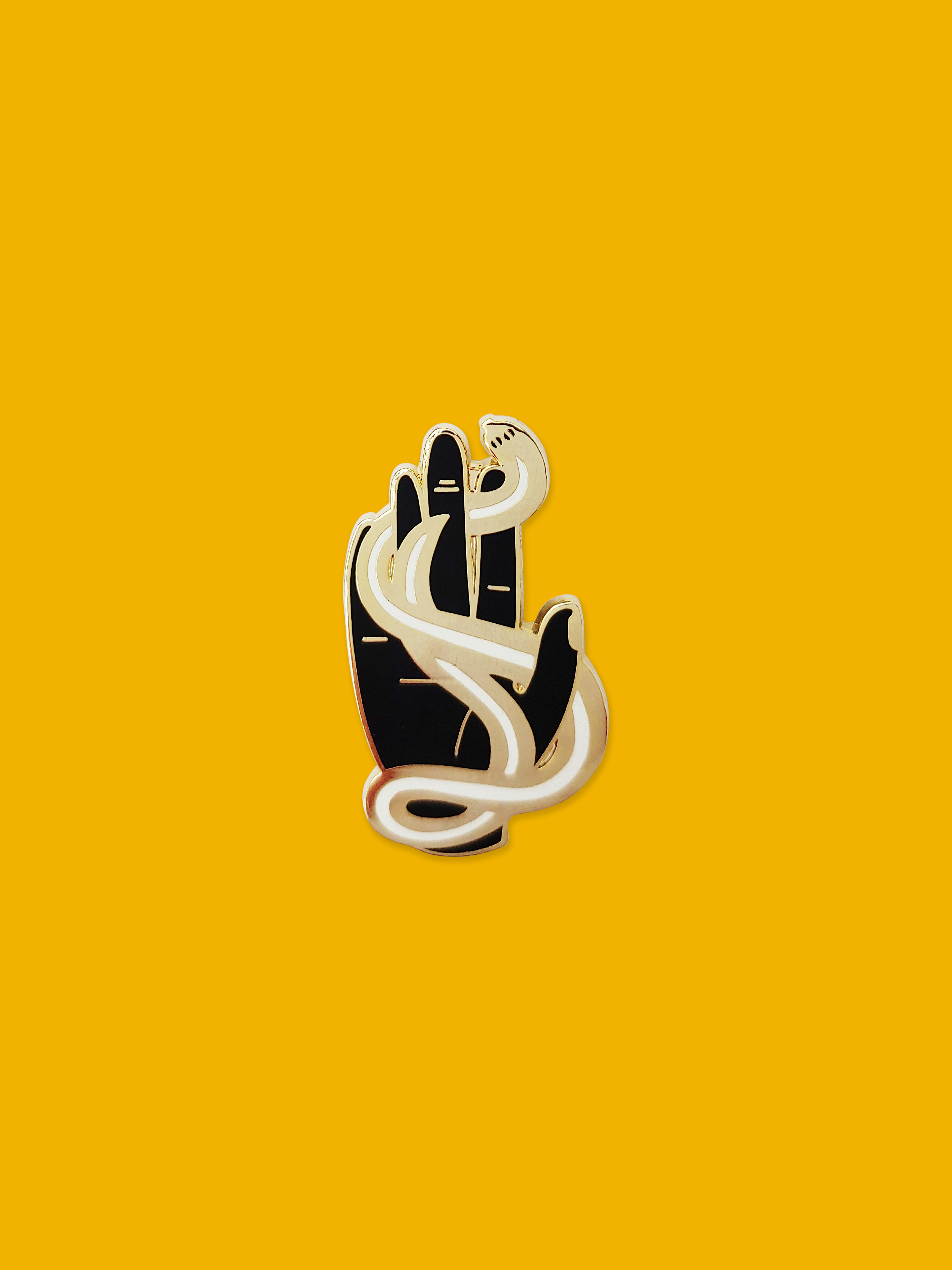 Hand and Snake Enamel Pin